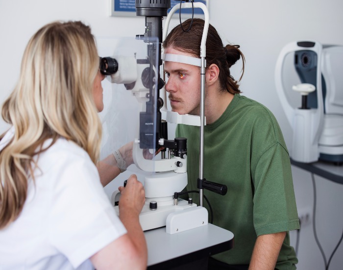 A person receiving treatment for Graves' eye disease at Spindel Eye Associates in Derry, NH